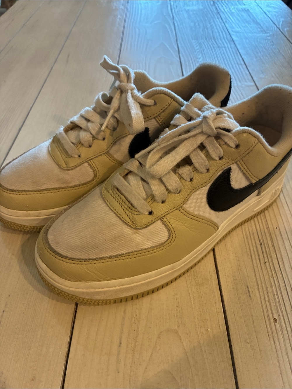 Nike Low-Top Sneakers in Beige and Black Accents